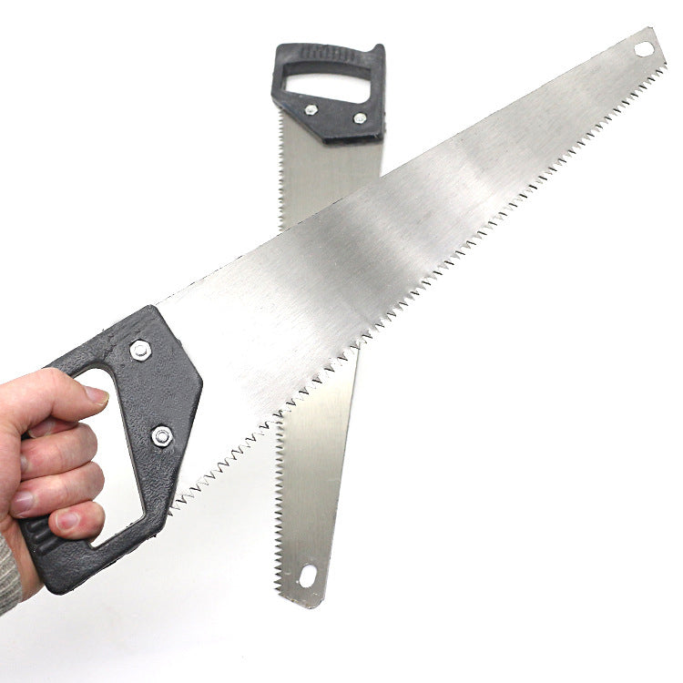 Close-up of hand saw with hardened steel blades.