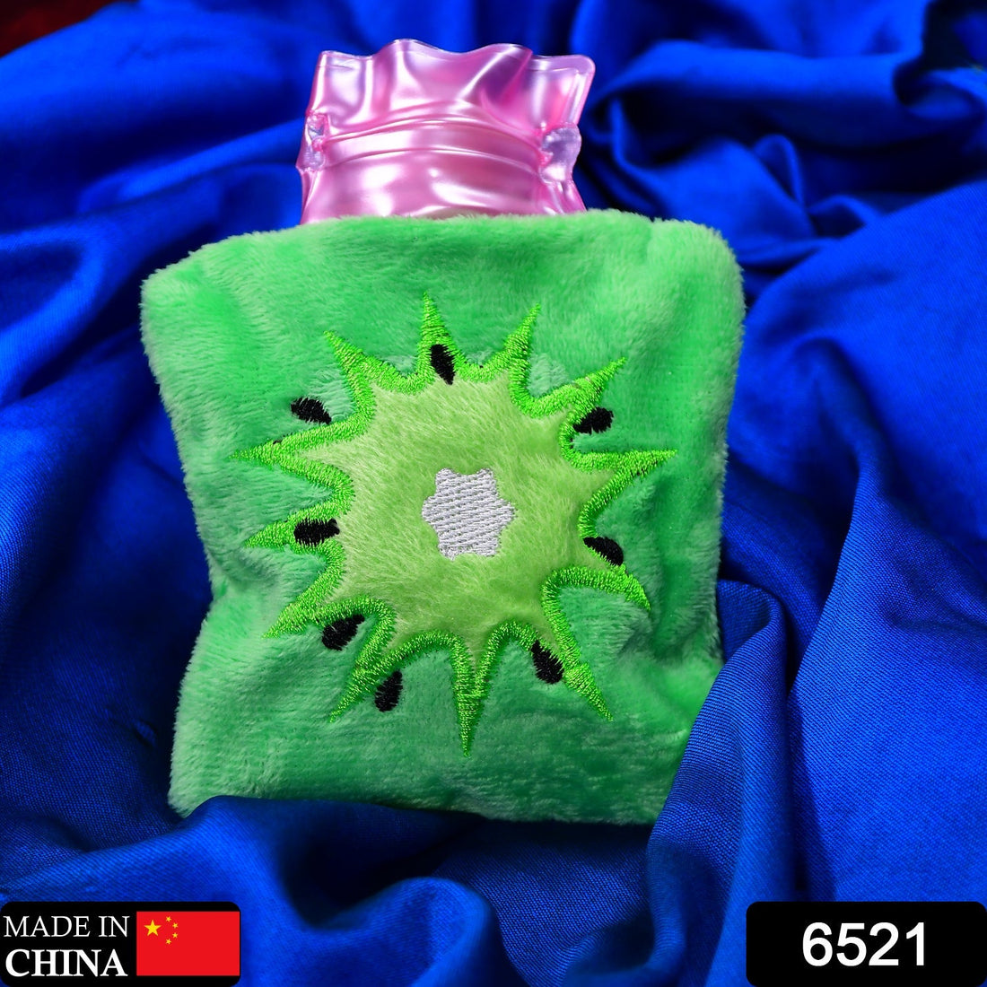 Small green hot water bag with cover for body warmth and pain relief