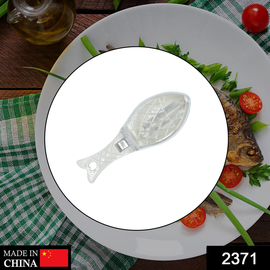 Fish scraper tool with ergonomic handle for easy use.