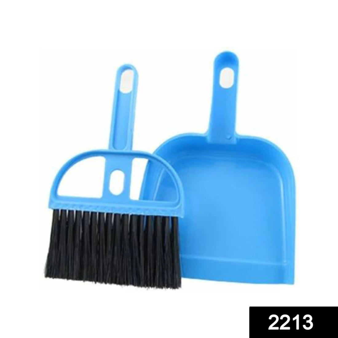 Efficient small broom and dustpan for household cleaning.