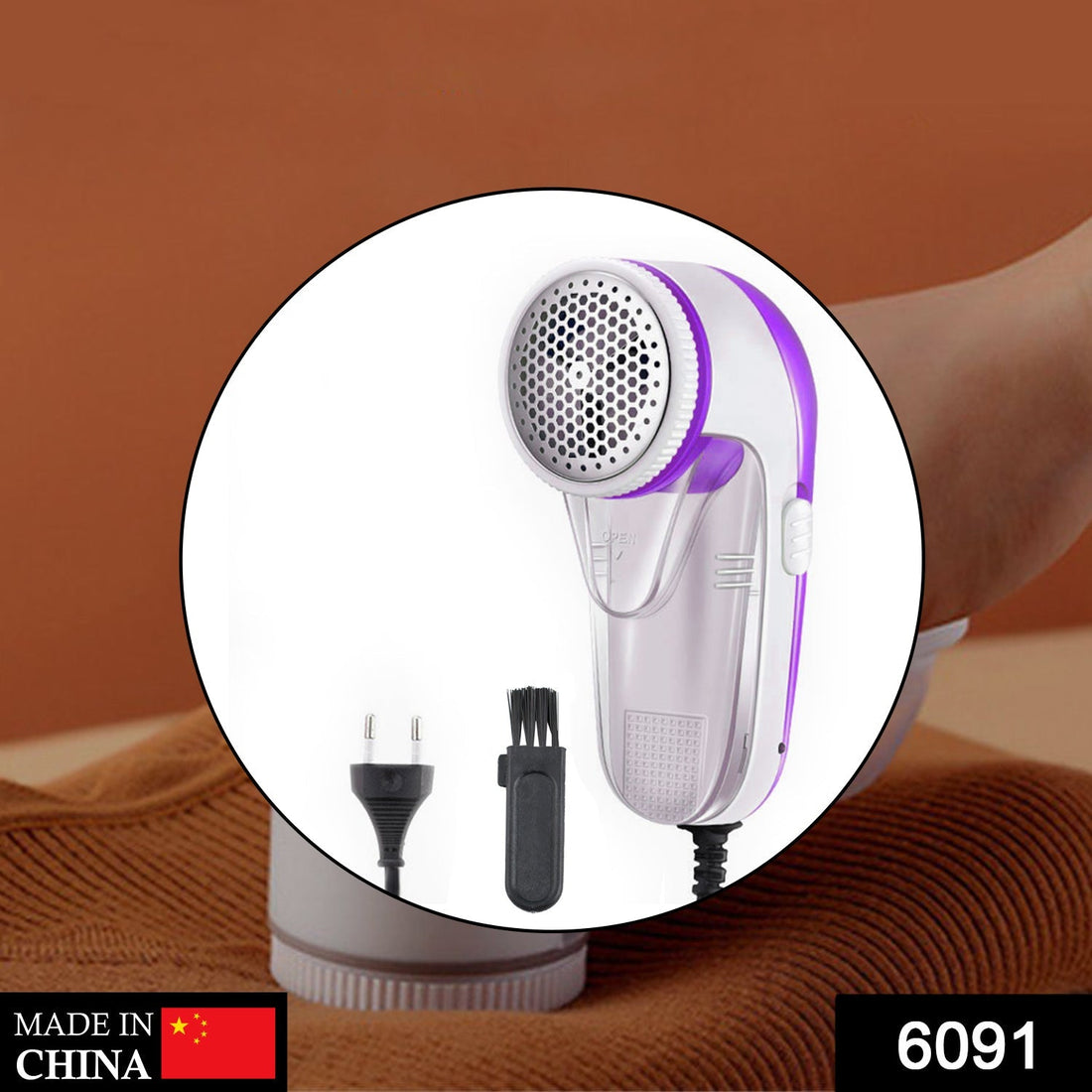 Lint remover tool designed for woolen fabrics, showing its sleek handle and blade