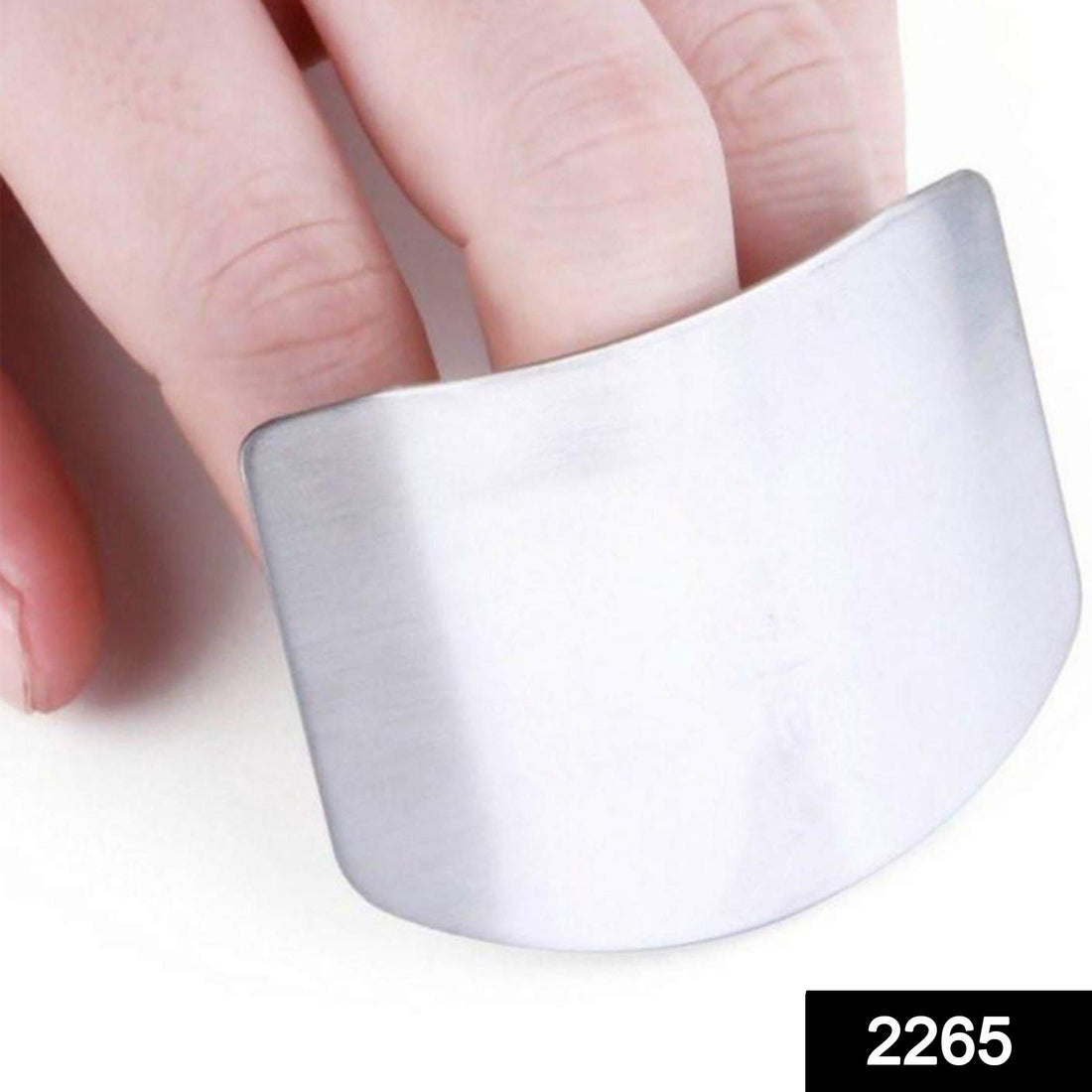 Stainless steel finger guard for safe cutting in kitchen.
