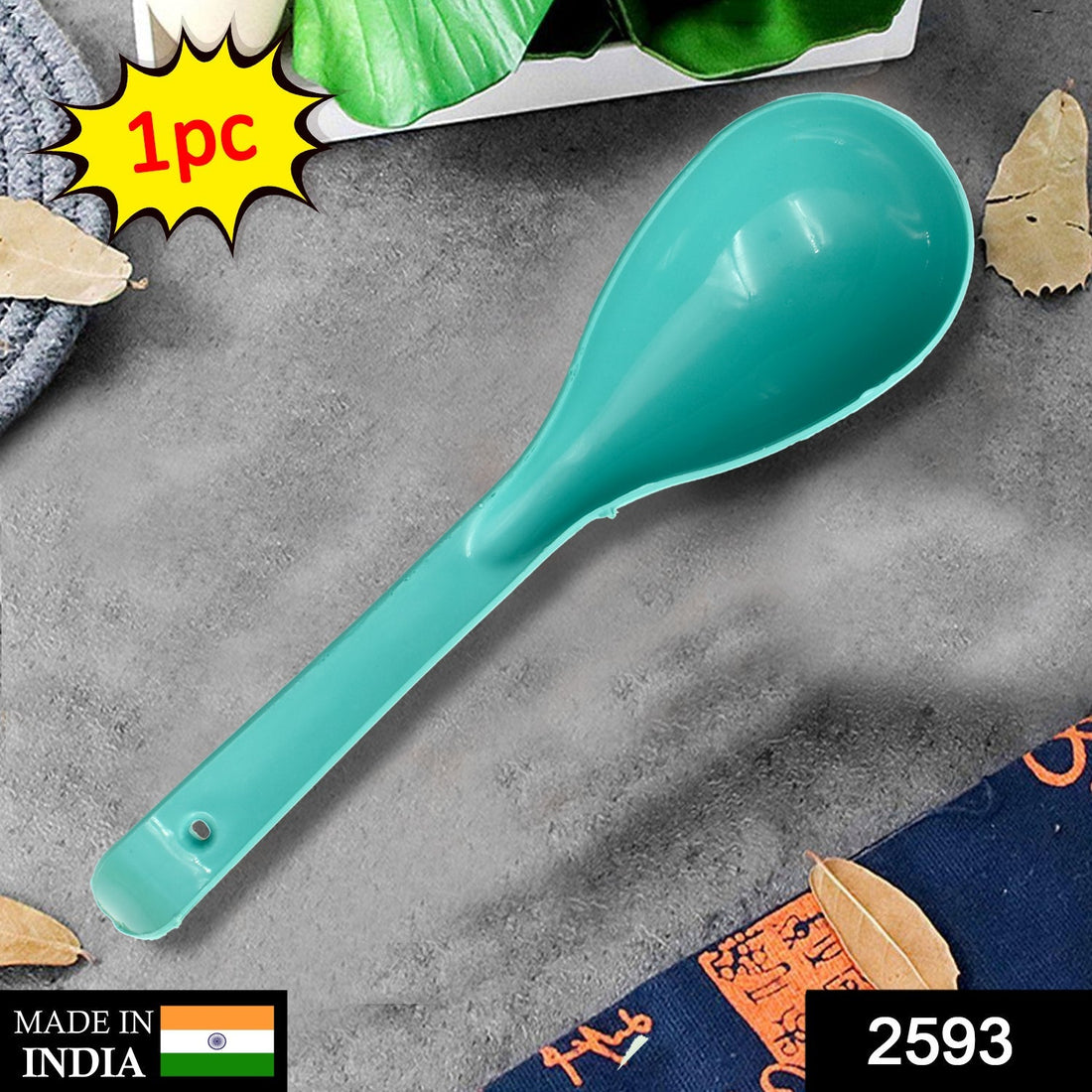 Ergonomic plastic serving spoon.
