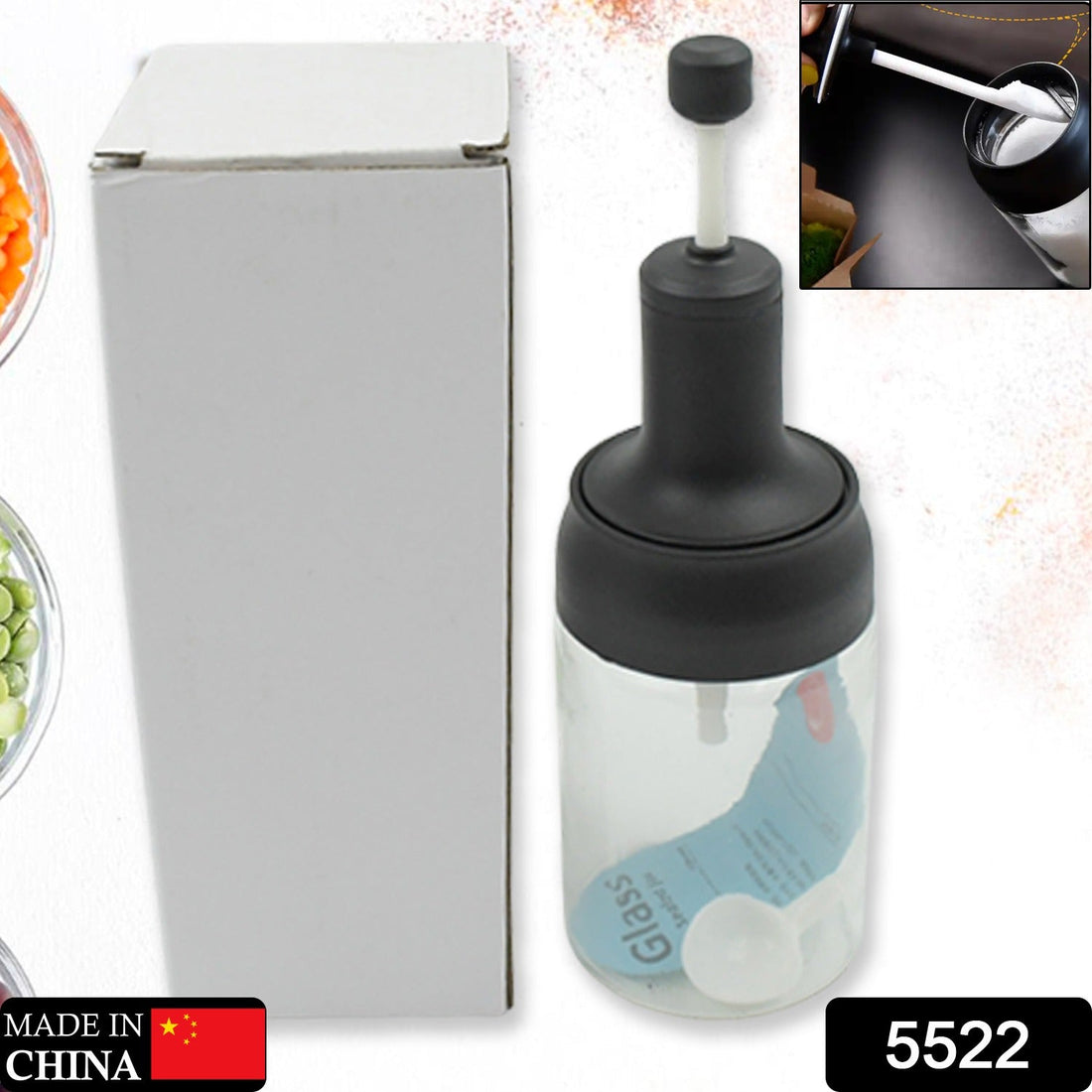 Heat-resistant seasoning jar with spoon for cooking.